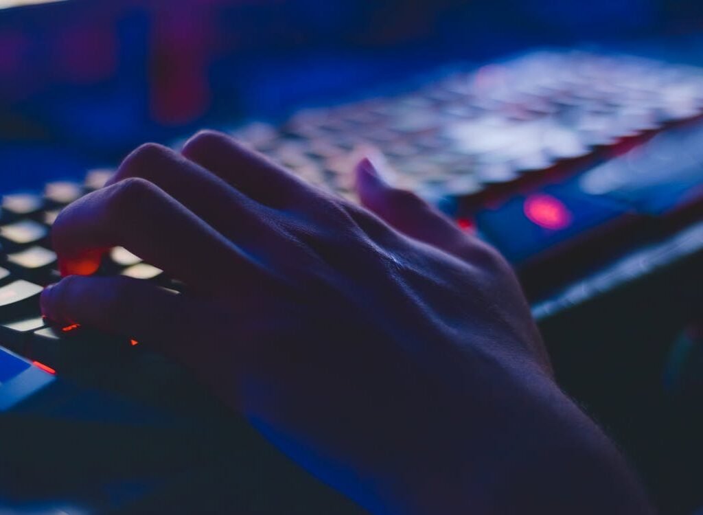 photo of person typing on computer keyboard, laptop keyboard not working can sometimes be fixed with keystrokes